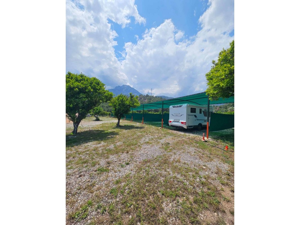 Парковочное место для каравана в Orange Beach Camp