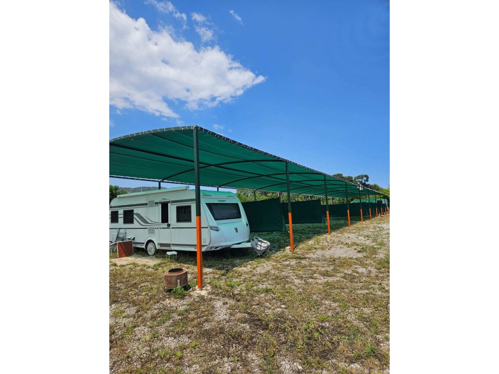 Парковочное место для каравана в Orange Beach Camp