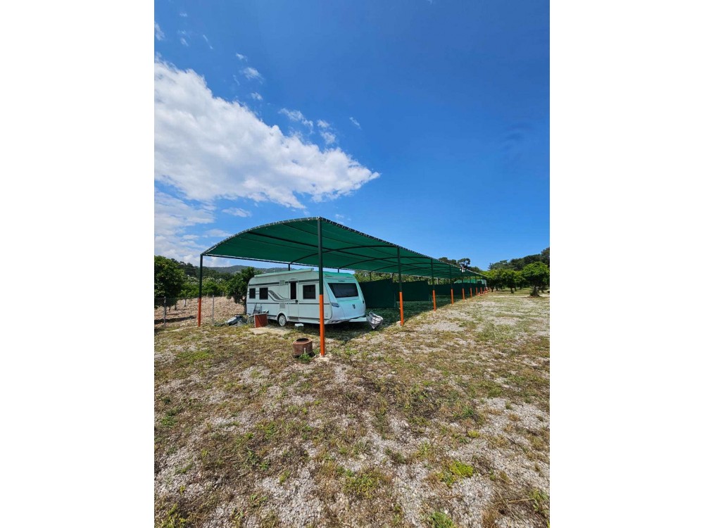 Парковочное место для каравана в Orange Beach Camp