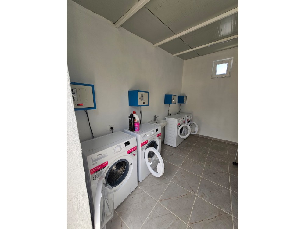 Парковочное место для каравана в Orange Beach Camp